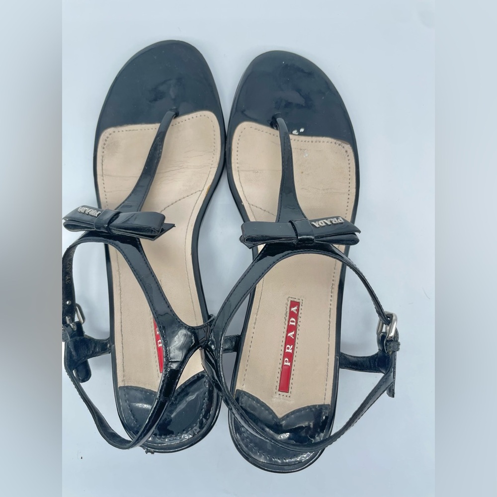 Prada Black Patent leather bow tie logo low heel wedge EU 40
Never worn. - Picture 6 of 12